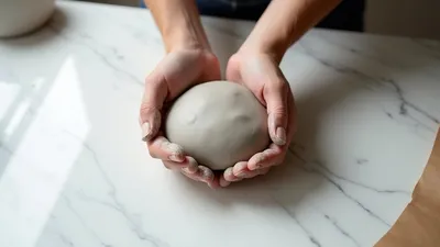 knead clay until pliable