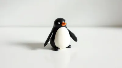 small penguin figurine design